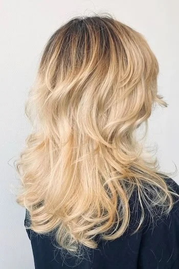 Blonde Layered Wolf Cut with Soft Waves