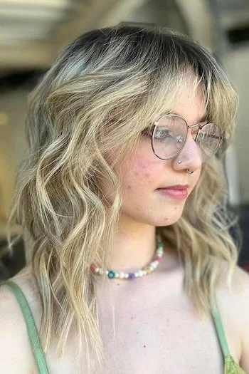 Blonde Wavy Wolf Cut with Baby Bangs