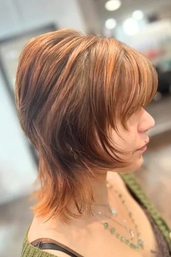 Copper Layered Wolf Cut with Face-Framing Bangs