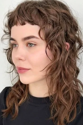 Curly Brunette Shag with Micro Bangs