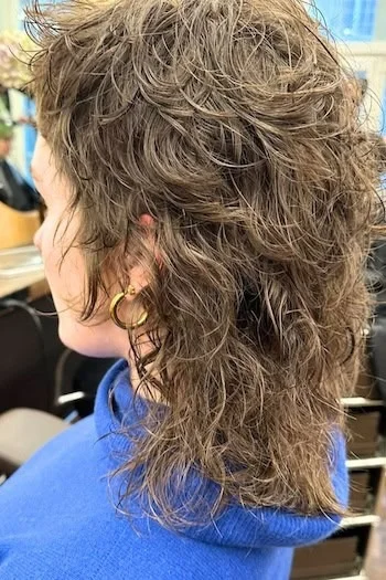 Curly Wet-Look Wolf Cut with Tapered Layers