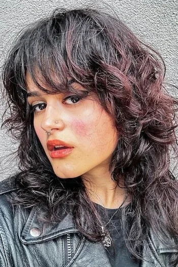 Edgy Shaggy Wolf Cut with Messy Curls