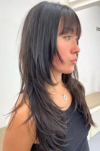 Long Layered Wolf Cut with Subtle Curtain Bangs
