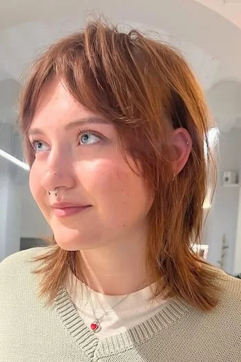 Short Wolf Cut with Choppy Layers and Micro Bangs
