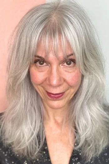 Soft Silver Shag with Wispy Curtain Bangs for women over 50