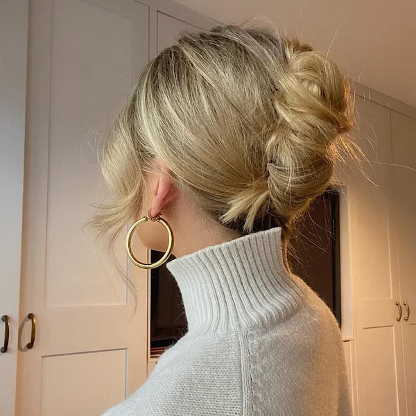 Soft Twisted Low Bun with Face-Framing Pieces