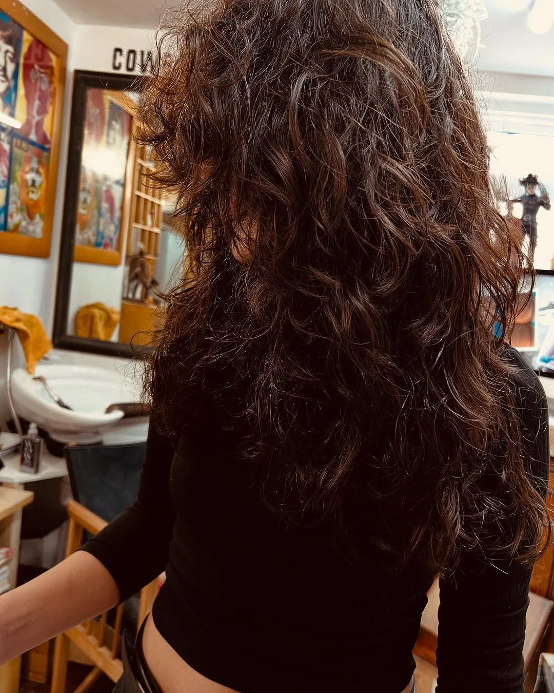Textured Curly Wolf Cut with Voluminous Layers