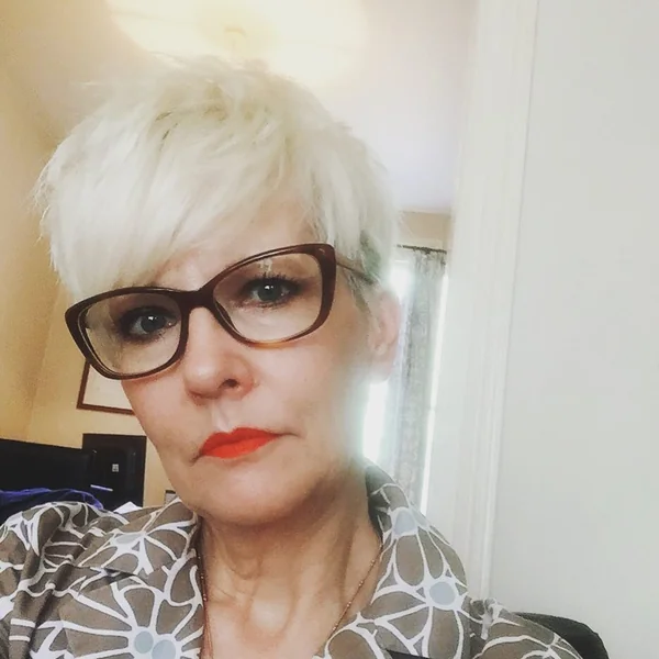 Bold Platinum Textured Pixie with Choppy Fringe