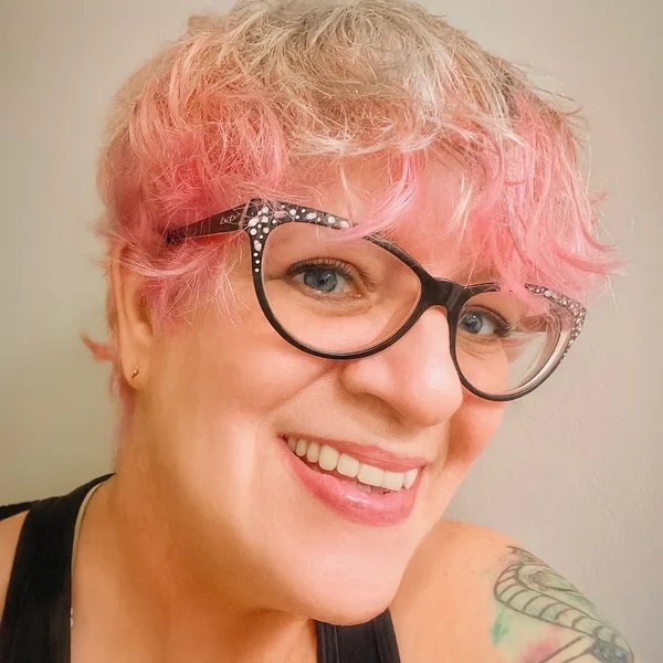 Playful Pink Pixie with Curly Texture and Volume