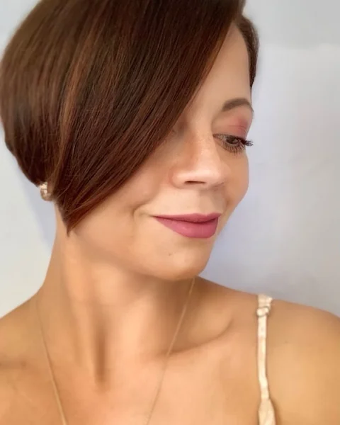Angled Auburn Pixie Bob with Deep Side Fringe