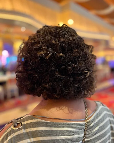 Bouncy Stacked Curly Bob with Defined Dark Coils