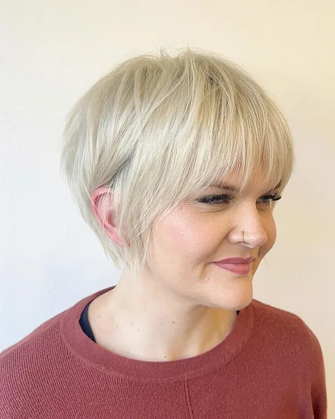 Creamy Blonde Pixie with Soft Tapered Edges