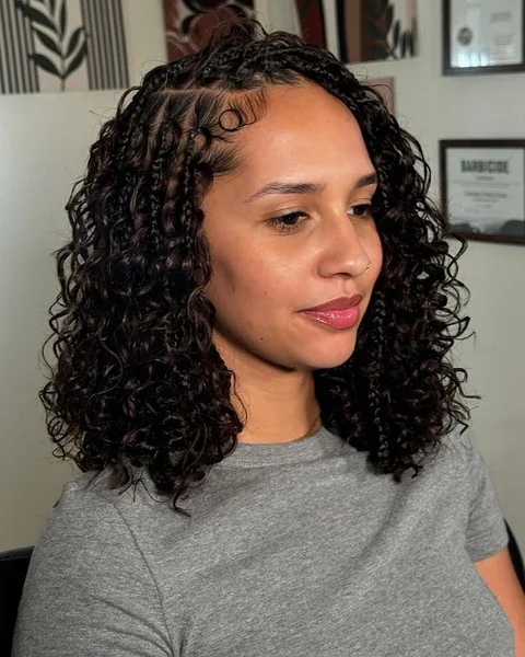 Curly Layered Bob with Defined Braided Accents
