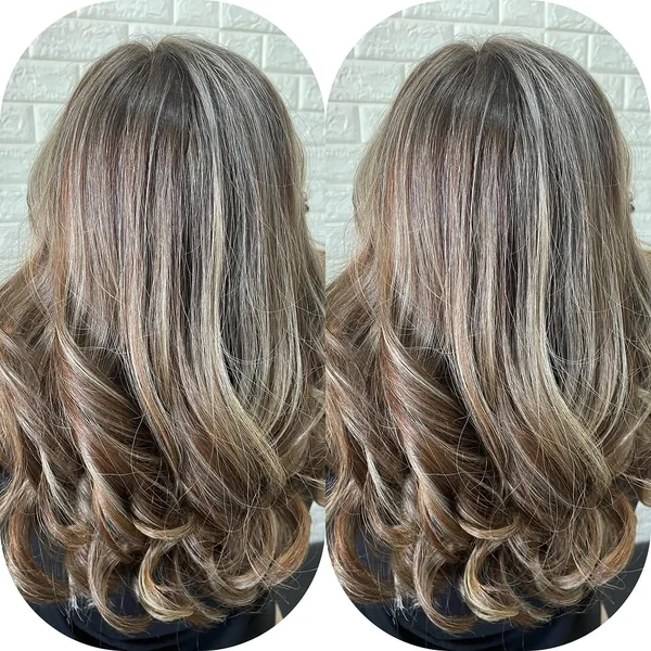 Dimensional Blonde Butterfly Cut with Defined Waves