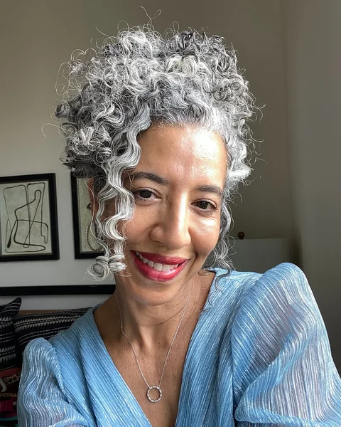 High-Volume Silver Curly Updo for Definition