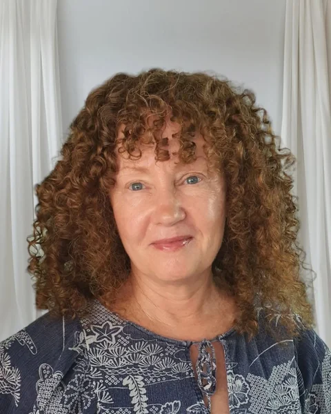 Mid-Length Warm Copper Curls with Bangs