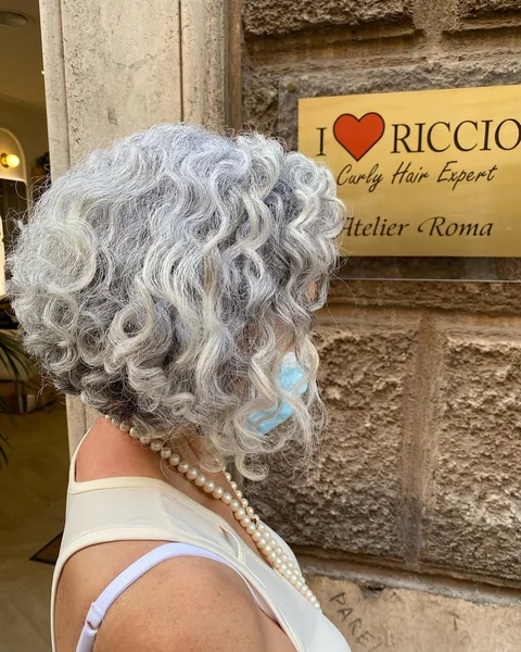 Perfectly Shaped Silver Curly Bob with Dark Undercut