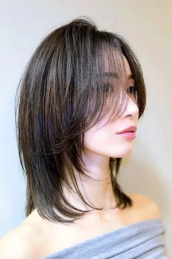 Sleek Wolf Cut with Airy Curtain Bangs