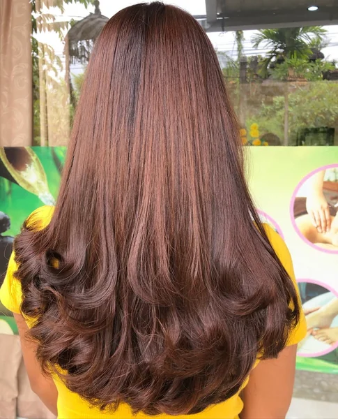 Subtle Layered Butterfly Cut with Smooth Volume