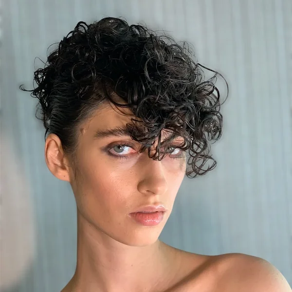 Ultra-Short Curly Pixie with Defined Forehead Coils