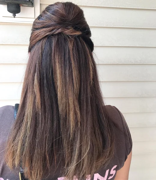 Half-Up Twisted Brunette Hair with Caramel Highlights