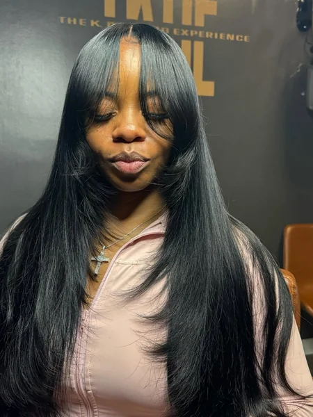 Long Black Hair with Face-Framing Curtain Bangs
