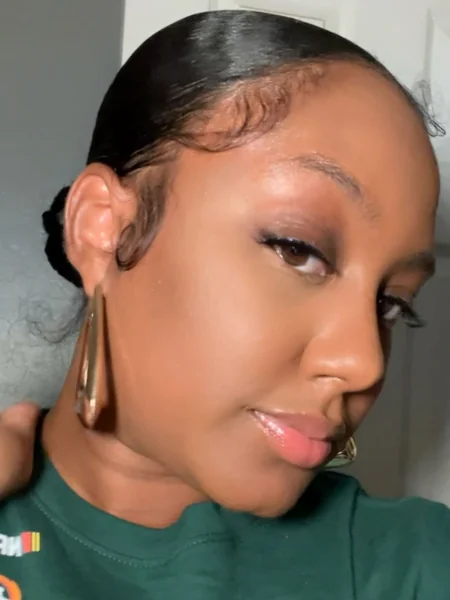 Sleek, Edgy Low Bun with Polished Edges