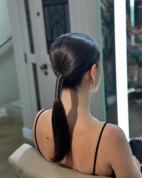 Ultra-Sleek Polished Low Ponytail with Wrap Detail