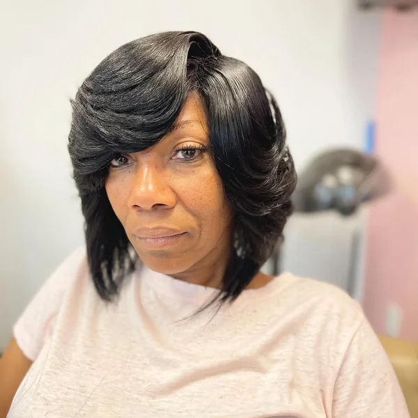 Beautifully Voluminous Black Bob with Feathered Layers