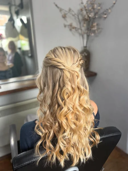 Bouncy Golden Spiral Curls with Elegant Half-Up Twist