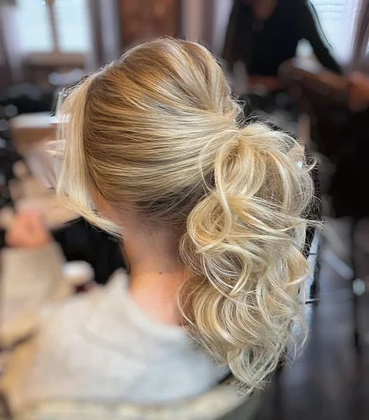 Casual Low Blonde Ponytail with Effortless Waves