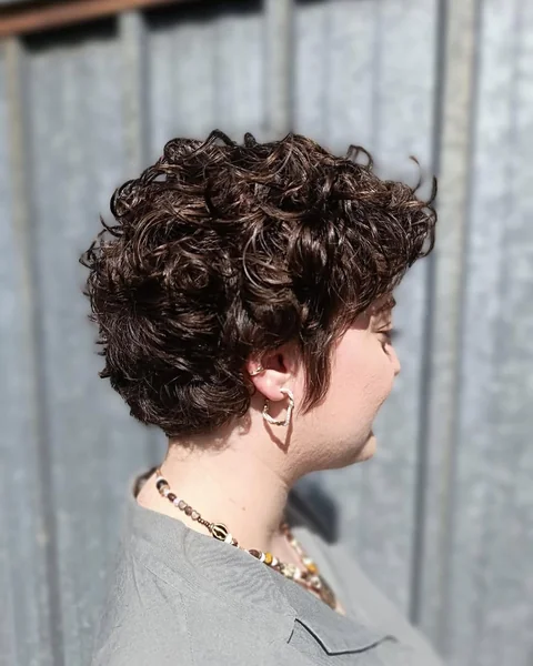 Chic Brunette Pixie Bob with Wispy Fringe