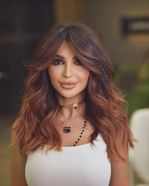 Copper Balayage Butterfly Layers with Curtain Bangs