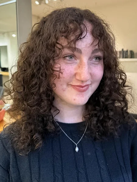 Dark Brown Mid-Length Curls with Soft Curly Fringe