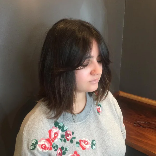 Dark Textured Bob with Long Face-Framing Curtain Layers