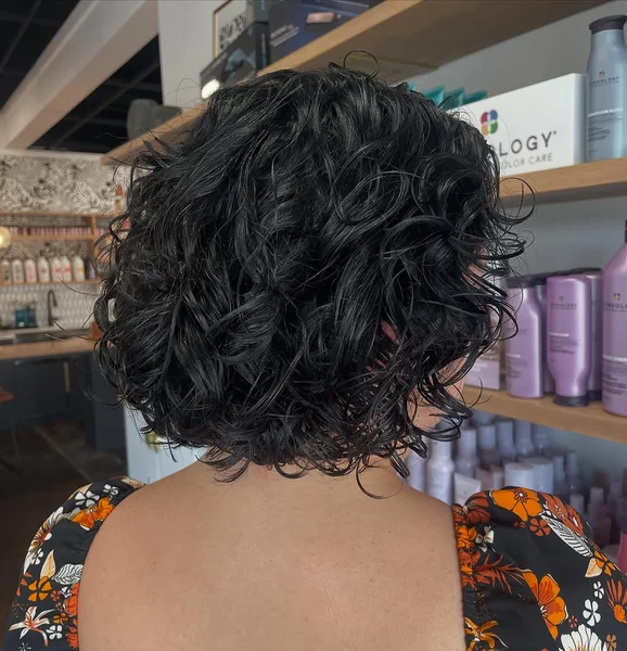 Dark Wavy Bob with Layered Volume and Soft Lift