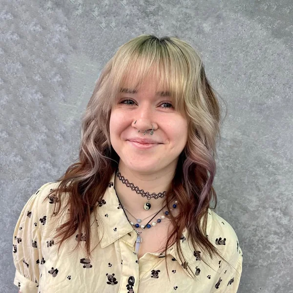 Deep Brunette Shag with Full Voluminous Bangs