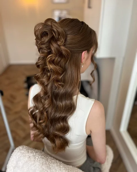 Detailed Half-Up Prom Style with Voluminous Curls
