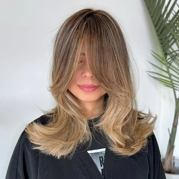 Dimensional Balayage Butterfly Cut with Full Fringe