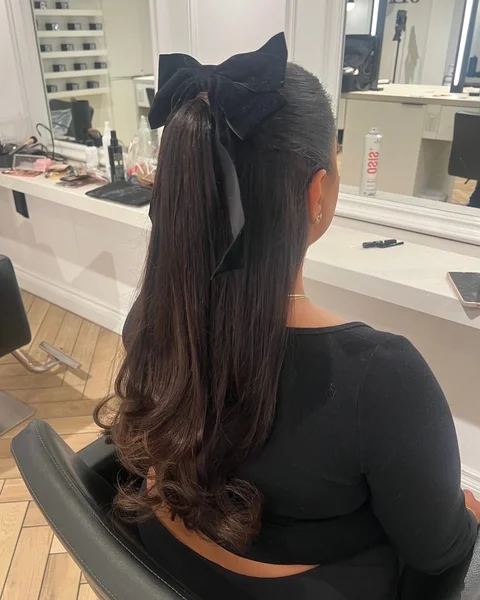 Effortless High Ponytail with Balayage and Soft Waves
