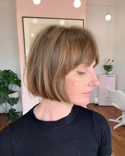 Effortless Layered Bob with Soft Brow-Grazing Fringe