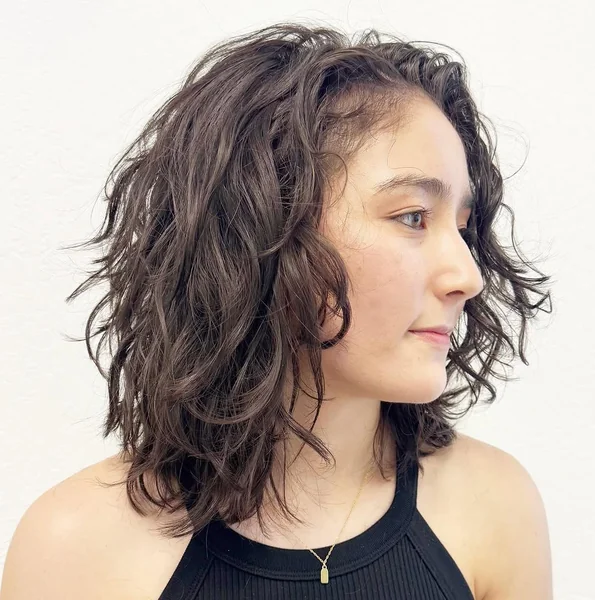 Effortless Textured Brunette Lob with Soft Beachy Waves
