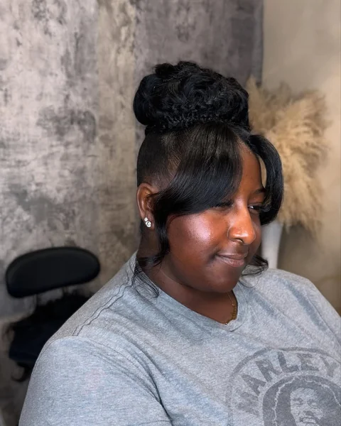 Elegant High Textured Roll Bun with Soft Curls