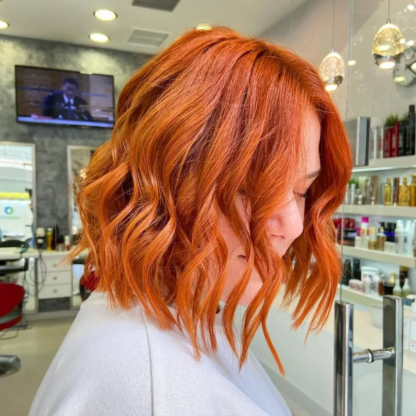 Fiery Copper Wavy Bob with Shag Layers