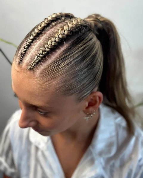 Four Sleek Accent Braids into Smooth High Ponytail