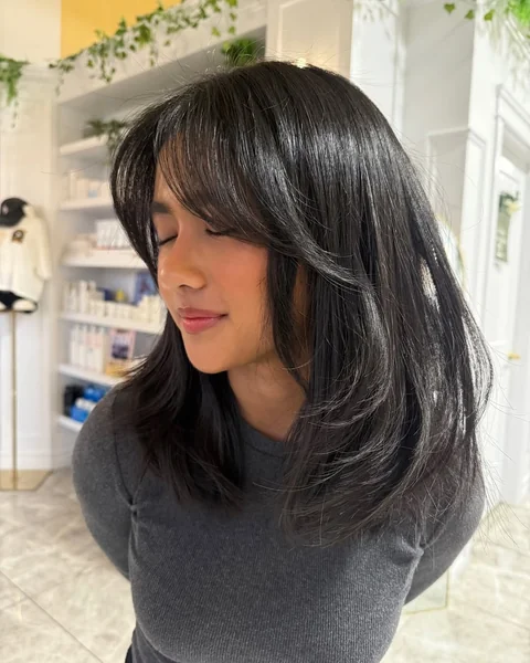 Glossy Midnight Midi with Soft Face-Framing Butterfly Layers