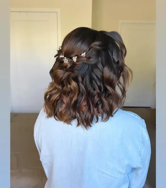 Half-Up Twisted Bob with Copper Highlights and Sparkle Pins