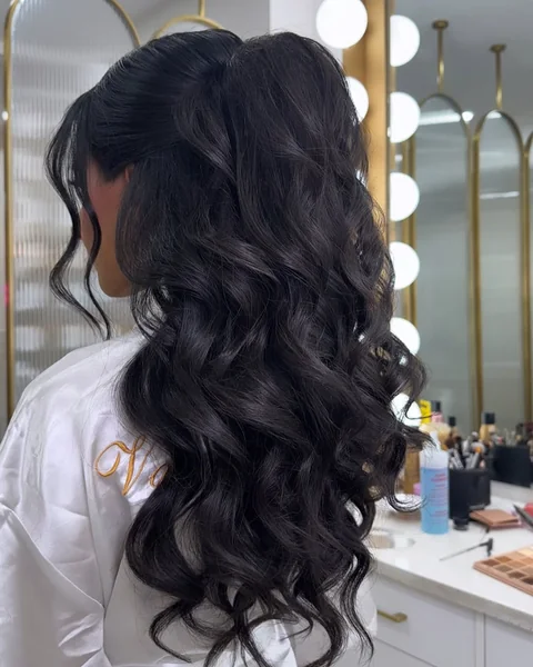 High Voluminous Half-Ponytail with Rich Black Waves