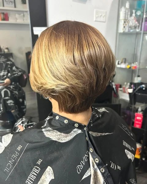 Highlighted Blonde Pixie Bob with Feathered Bangs