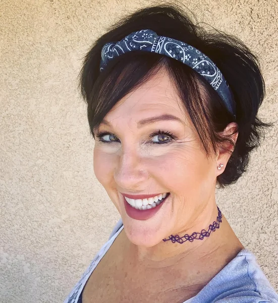 Layered Blonde Pixie Bob with Volume